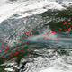 Fires (red dots) and smoke over Siberia on July 4.